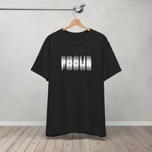 Men's motivational and inspirational Graphic T-Shirt - Short Sleeve Crew Neck Regular Fit Casual Wear | Soft & Breathable Fabric, Durable Print, Everyday Comfort, Machine Washable, minimalist and modern indoor studio with neutral background and wooden