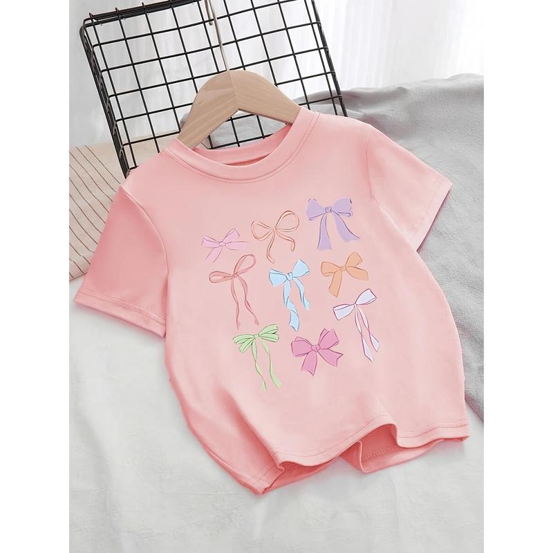 Girls' Pastel Bow Print T-Shirt - Soft Pink Blouse with Bow Patterns- Everyday & Party Outfit for Toddlers & Kids - Machine Washable Knit Top, Playful Toddler Apparel, Playful Graphic Tee, Comfortable Fit Tee