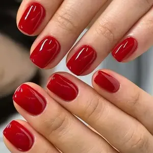 Solid color, short red nails, 24 pieces per box, includes application tools.