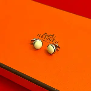 Pre-owned HERMÈS Stainless Small Leather Goods Eclipse Metal Earrings