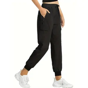 Women's lightweight cargo jogging pants, hiking pants with zippered pockets, suitable for casual travel and quick-drying.