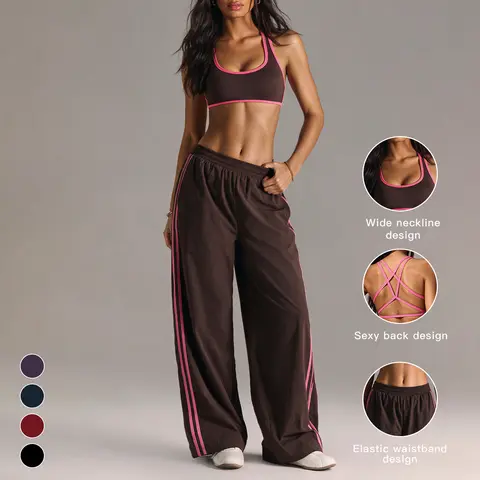 Tenwolf women’s color-block sports set featuring a crisscross-back sports bra and side-striped wide-leg pants, two-piece fitness outfit