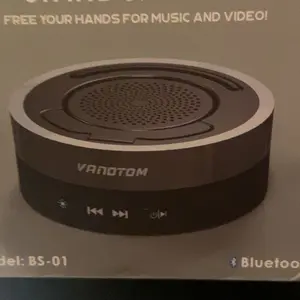 VANOTOM 5-in-1 Wireless Speaker Phone Stand | BT Speaker, Power Bank, RGB Light | Foldable for All Phones