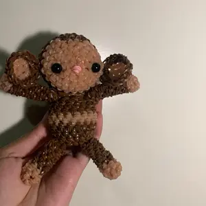 Crochet monkey made with rubber bands