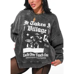 IT TAKES A VILLAGE OVERSIZED GRAPHIC SWEATSHIRT