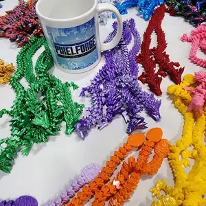 Surprise 3D Printed Articulated Dragons by Cinderwing3d