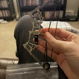 Mini archery bow set with stainless steel bow and 12 arrows, mini compound bow Set Mini Composite Bow Set, Portable Archery Kit for Outdoor Fun stainless steel mini composite bow,  suitable for beginner archery practice, entertainment and fun gift