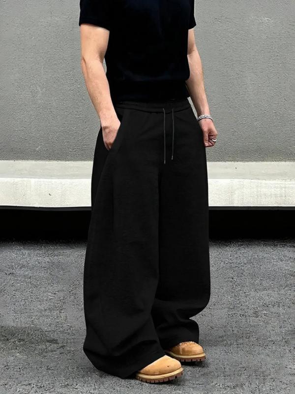 Unisex Minimalist Ultra-Baggy Wide-Leg Sweatpants – Solid Black, Premium Heavyweight Fabric, Relaxed Oversized Fit, Modern Urban Casual Aesthetic, Perfect for Effortless Street Style, Durable & Versatile, Ideal for Daily Wear/Minimalist Outfits