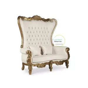 Luxury Gold Throne Chair Royal Sofa Event Photo Backdrop with Tufted Back and Ornate Gold Accents.
