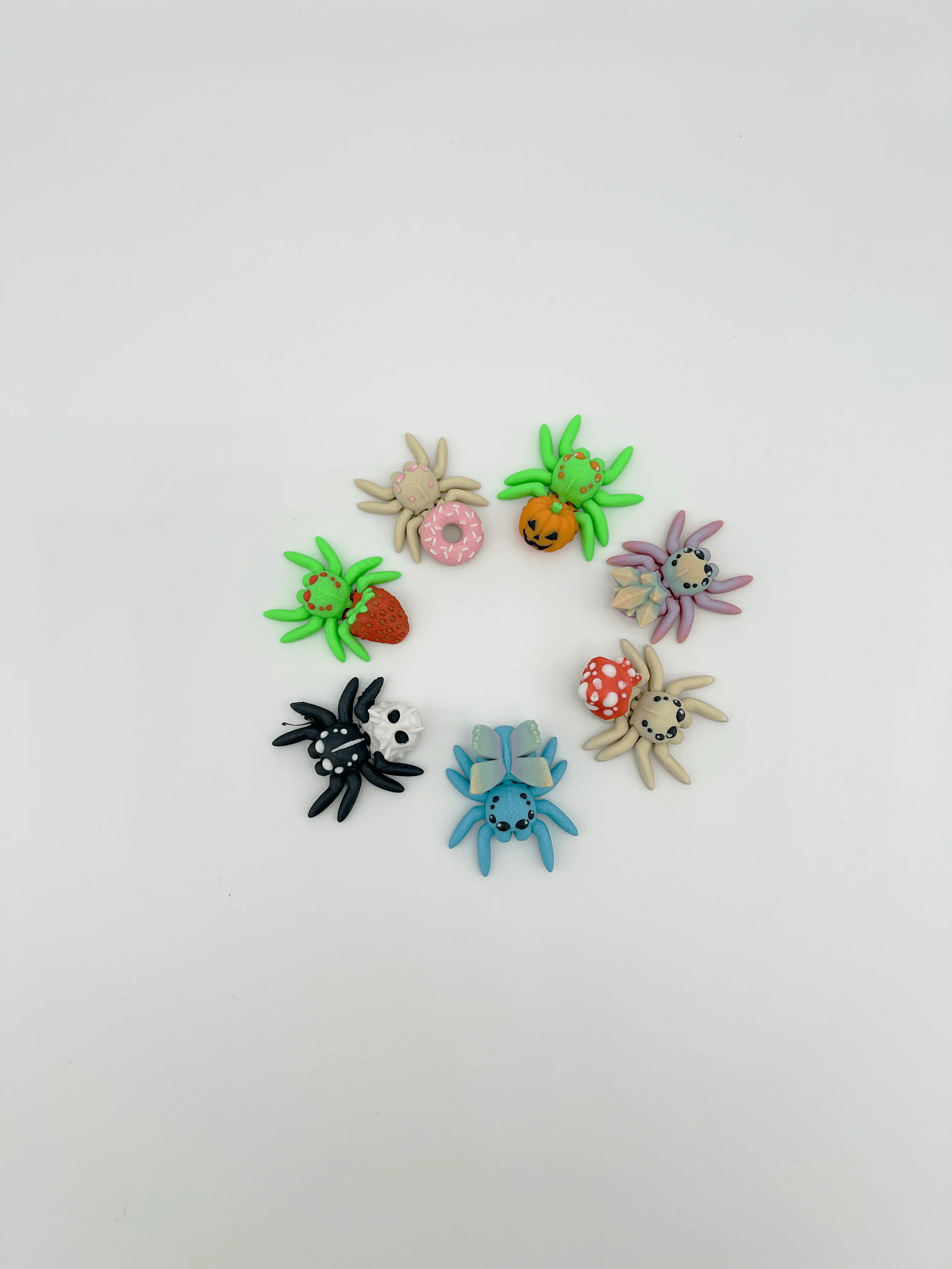 Silly Spiders 2-8 Inch Pumpkin, Skull, Donut & Mushroom Styles with Articulating Joints for Versatile Use