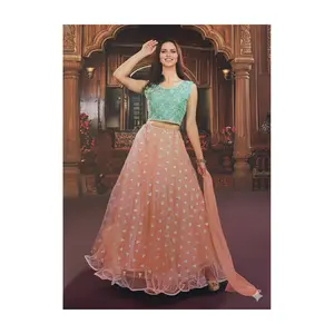 Mint Embroidered Art Silk Blouse comes with sleeve attached (Size 38/Medium) + Peach  A-line net lehenga with white geometric motifs+ Matching peach dupatta for soft, romantic drapeSet (3‑Piece)#DNO_99