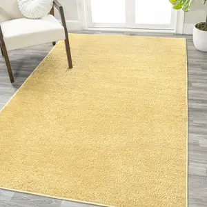 JONATHAN Y Haze Solid Low-Pile Indoor Mustard Area Rug; for Living Room, Kitchen, Bedroom, Dining Room, Office