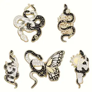 Spooky snakes enamel pin
