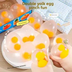 Stress-relief double yolk transparent simulation egg toy for children, a decompression gadget, a gift for students on Children's Day relaxation musical butter anxiety portable gift