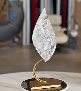 Statement Clear Quartz Flame on Brass Stand – Crystal Sculpture for Modern Interiors