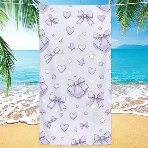 Lavender Bows Hearts Whimsical Pastel Microfiber Beach Towel! Relax with our premium sand free, rapid dry, and compact oversized pool blanket. The absolutely ultimate cute aesthetic gear designed for summer pool parties!