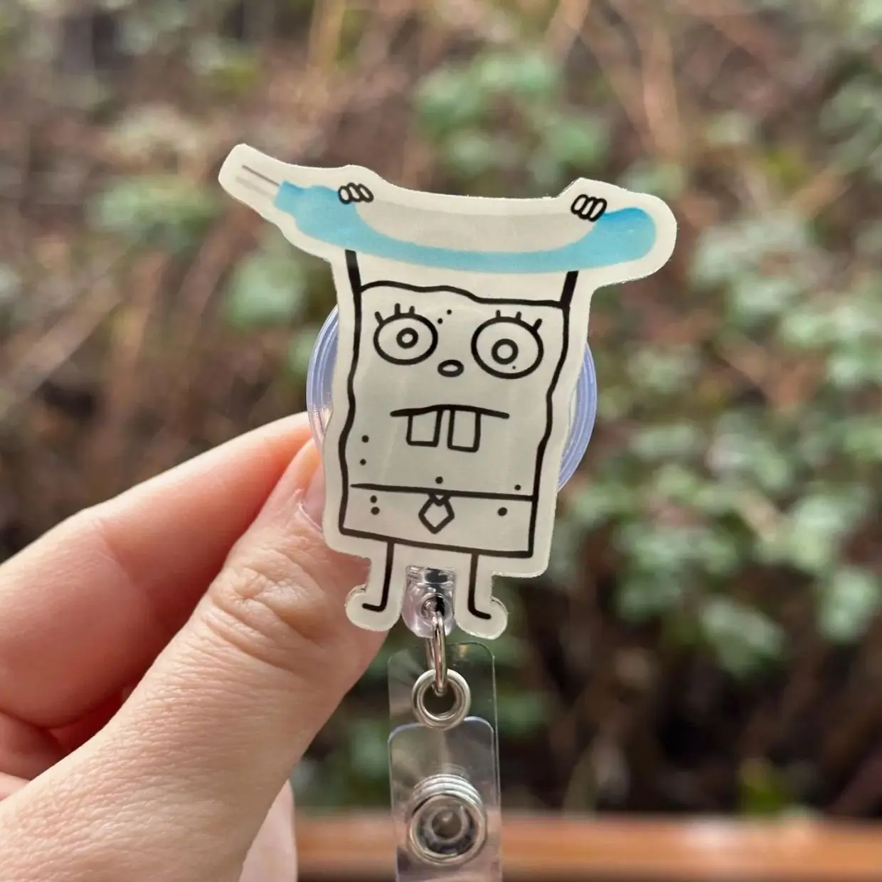 Cartoon Doodle Purewick -Badge Reel