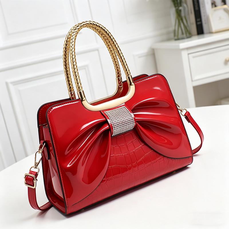Women’s glossy leather handbag with top handle — medium-structured shoulder/handbag with adjustable strap