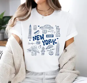 New York City Doodle Collage T-Shirt, NYC Landmarks Hand-Drawn Tee, Urban Aesthetic Streetwear Top