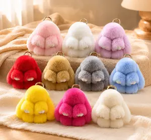 Adorable plush lop-eared rabbit charm—a versatile accessory for bags and backpacks, perfect as a small gift for girls; available in various solid colors.