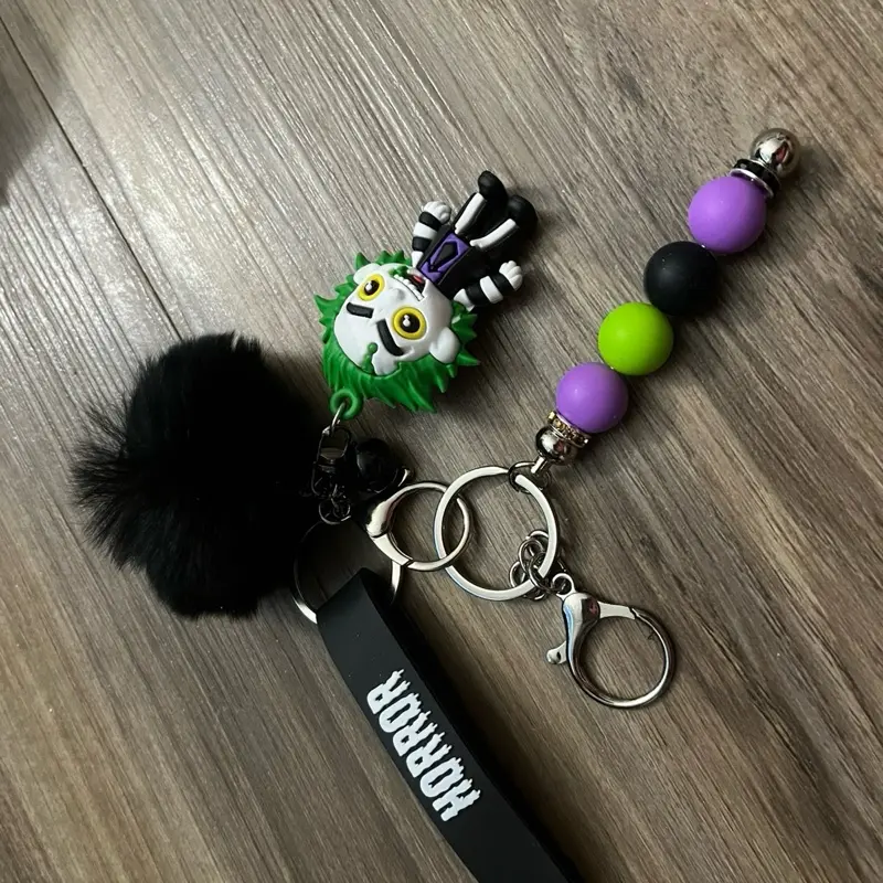 Beetlejuice Keychain - Black Beetlejuice Design with Skull Charm, Assorted Beads, and Decorative Pendant