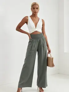 A women's fashionable vacation style solid color wide leg pants with high waisted pleats and a slimming effect, versatile casual pants suitable for summer, music festivals, markets, camping, picnics, and outdoor leisure scenes