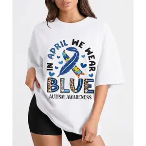 In April We Wear Blue Autism Awareness Ribbon And Puzzle Piece Print T Shirt Casual Round Neck Short Sleeve For Women Autism Awareness Month
