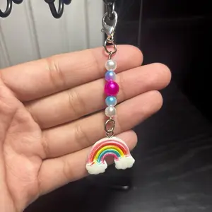Handmade Rainbow Stitch Marker with Pearl Beads and Charm for Knitting and Crochet Projects Unique Design and Versatile Use