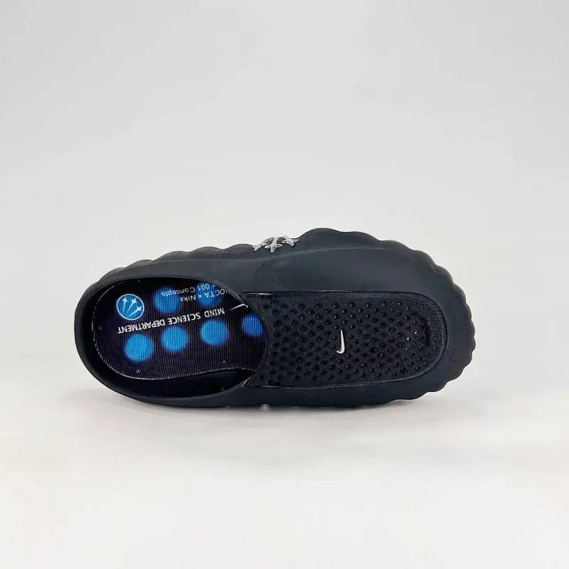 High-Traction Blue Dot Rubber Outsole All-Black Chunky Slide Sandals Seamless One-Piece Structure Perforated Breathable Top Surface For All-Day Indoor Lounging Downtown Convenience Store Runs