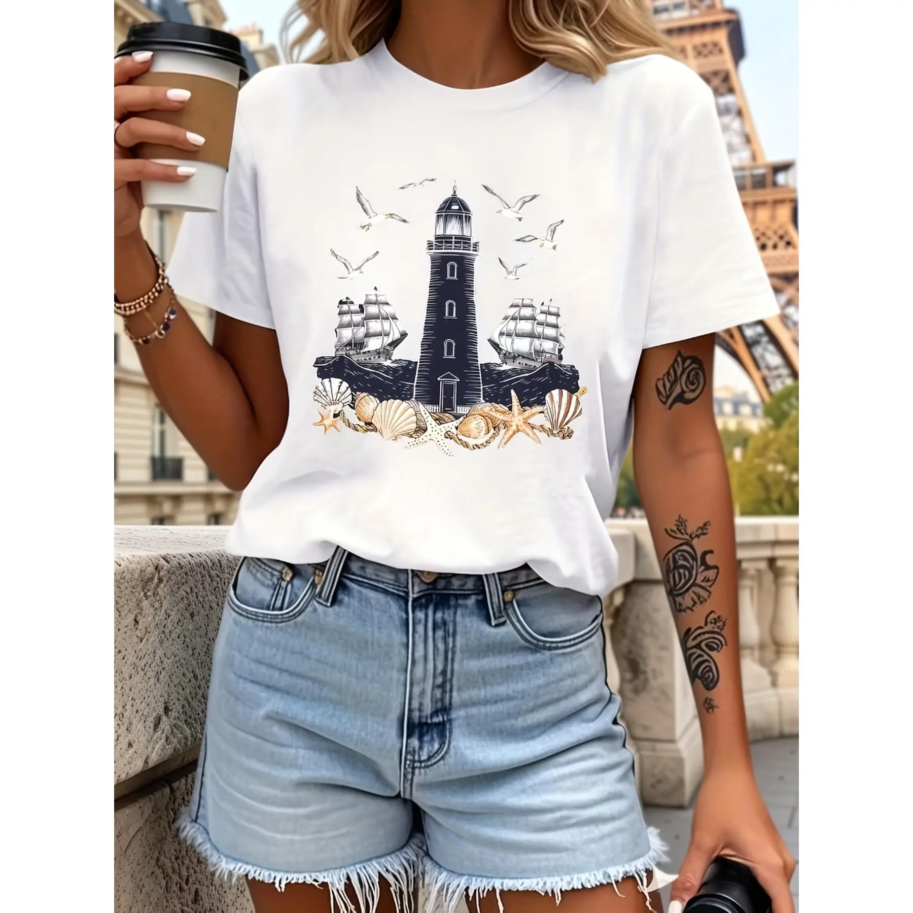 Coastal Theme T-Shirt | Women’s T-shirt with lighthouse, seagull, and boat pattern – comfortable short-sleeve casual top – navy blue geometric coastal design – machine washable for all seasons – everyday comfort – coastal theme shirt – 5
