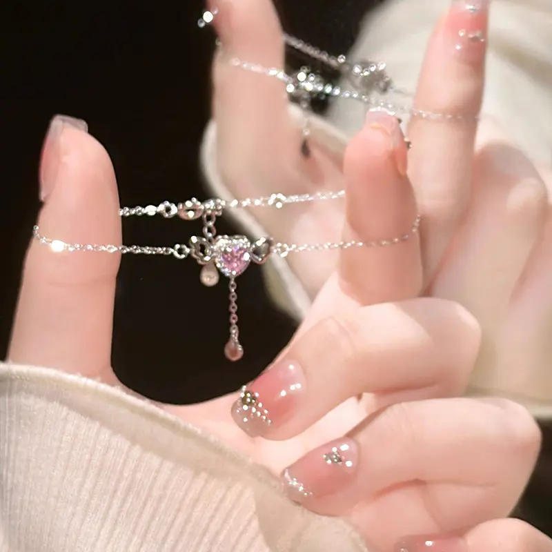 22018 # Pink Crystal Love tassel Bracele