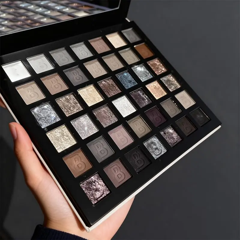 42-shade Smoky Eyeshadow Palette features highly pigmented matte, shimmer, and glitter texturesEye shadow and brush。 , is waterproof and long-lasting, and can be used on the  and face. It boasts excellent color payoff.Eye shadow and brush。