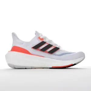 Cool summer gradient mesh travel running shoes, full perforated airflow upper to avoid stuffiness, lightweight responsive cushion, slip-resistant outsole. Fresh white orange tone brings bright vibe for weekend trips and seaside strolls.
