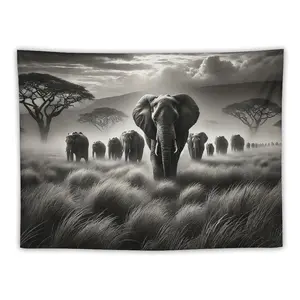 Majestic Elephant Herd Tapestries Black - and - White Scene with Giant Elephant Leading Vast Grassland Extending into Distance Sunlight and Clouds Add Serene Vibe