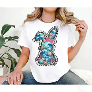 Girls Casual Round Neck Short Sleeve TShirt Featuring Easter Bunny Pink Bow and Colorful Swirls Print for Spring Festival and Holiday Celebration
