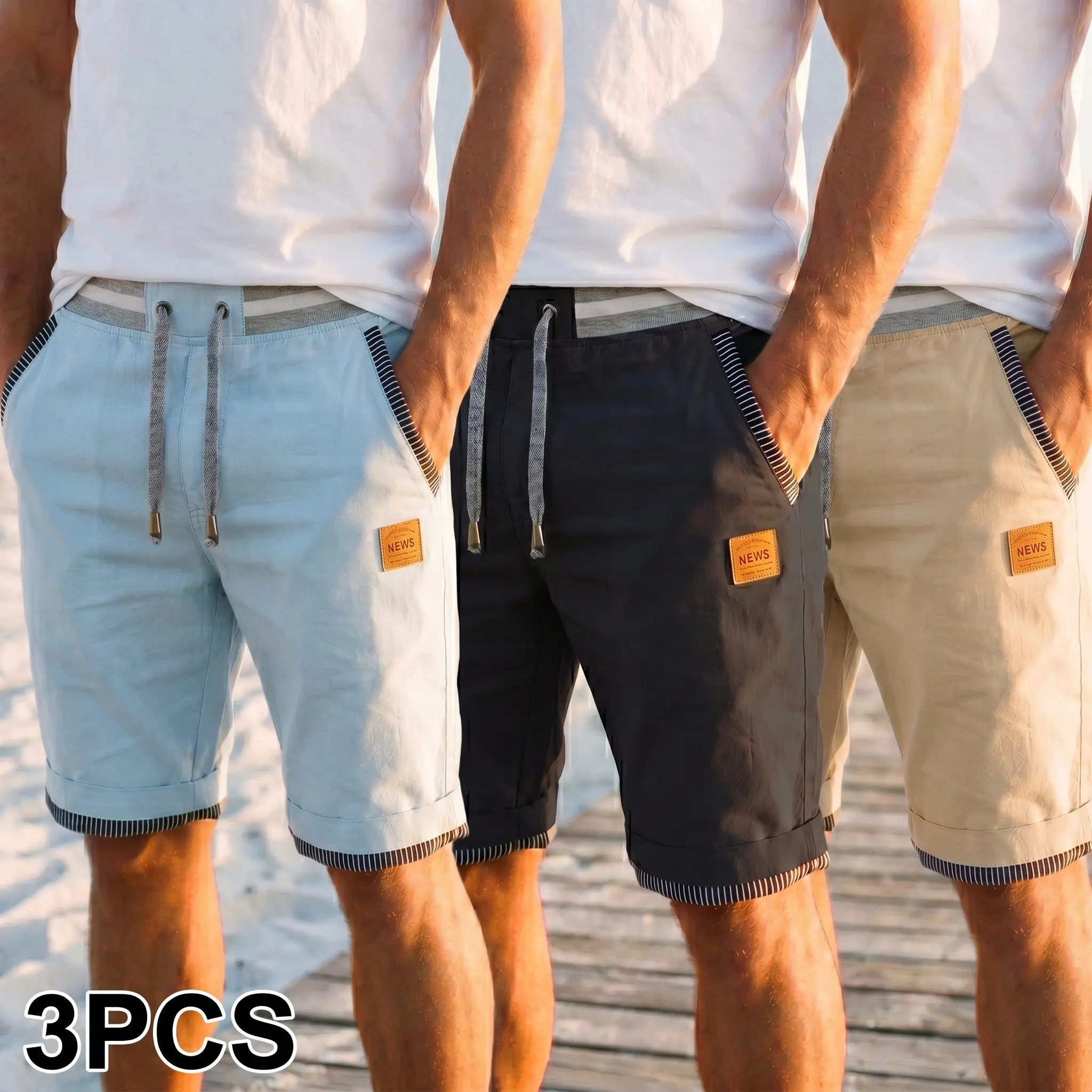 Men’s summer casual shorts—mid-length shorts for men; trendy patchwork shorts with an elastic waistband, mixed colors and drawstring, side stripes with piping, and a leather brand label decoration. Effortlessly conveys a relaxed vacation vibe, suitable fo