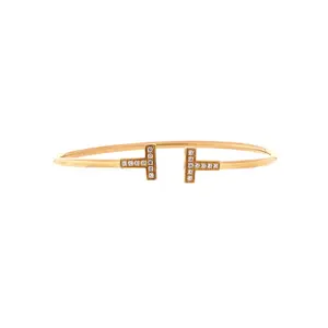 Pre-owned Tiffany & Co. T Wire Bracelet 18K Yellow Gold and Diamonds by Rebag