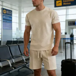 Men's Crew Neck Short Sleeve Ensemble Elegant Embossed Pattern Relaxed Fit Comfort Set Trendy Casual Wear for Summer Outings Business Trips and Weekend Getaways