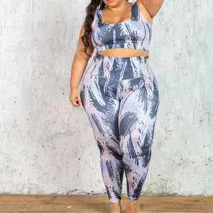 Blue Splash Curvy 2-Piece Workout Outfit - Stylish Sports Bra and Leggings Set for Plus-Size Fitness Enthusiasts -Body-Adaptive Activewear - Fitness Attire for Women - High-Waist Leggings - Plus-Size Athletic Gear