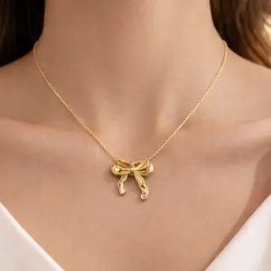 Elegant Gold Bow Pendant Necklace Dainty Jewelry with 3D Design High-Polish Finish Lightweight Comfortable for All-Day Wear Perfect Gift for Special Occasions