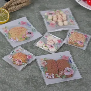 200pcs Clear Floral Snack Bags with Safe Seal – Versatile Party Favor Treat Pouches for Business & Home Use Baking package small cookie bag 5 color flower translucent self-adhesive sealing bag snow crisp fruit bag jewelry bag