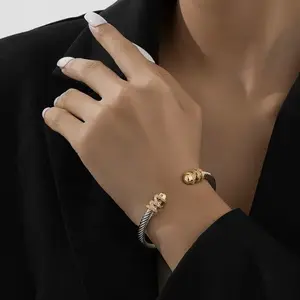 Vintage Stainless Steel Cable Bracelet – Retro Twist Bangle with Gold Accents & Gemstone Details