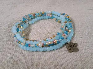 Blue Boho Seed Bead Bracelet Stack – Set of 6 Stretchy Bracelets with Hibiscus Charm
