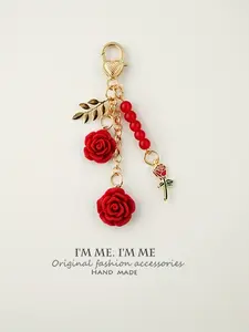 A sweet surprise for her! This rose & pearl bag charm is the perfect Women's Day gift—adds a touch of romance to any bag or keys. Fashion Bag Charms Bag Pendant Bag Decoration #WomensDayGift #RoseCharm #SpringAccessory #GiftForHer