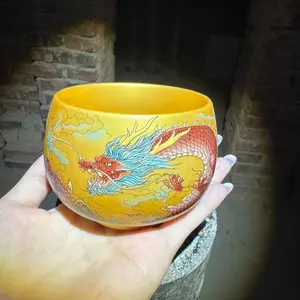 Jianzhan Master Cup Tea Cup Handmade with Vibrant Dragon Design and Golden Base for Authentic Tea Lovers