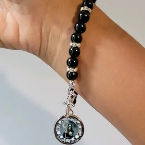 Cross and Santa muerte charm beaded bracelet