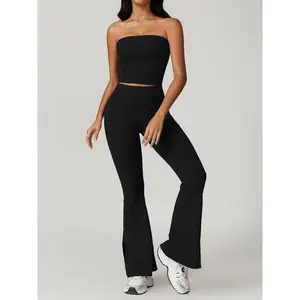 Women’s two-piece set featuring a solid crop tube top and high-waisted flared-leg tracksuit bottoms; sporty, breathable, comfortable outfit for yoga, gym workouts, and running; ladies’ sportswear for fall; jogging suit set.