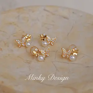 Sweet and elegant butterfly stud earrings with diamonds for women, fashionable and gentle temperament earrings, niche versatile design ear accessories