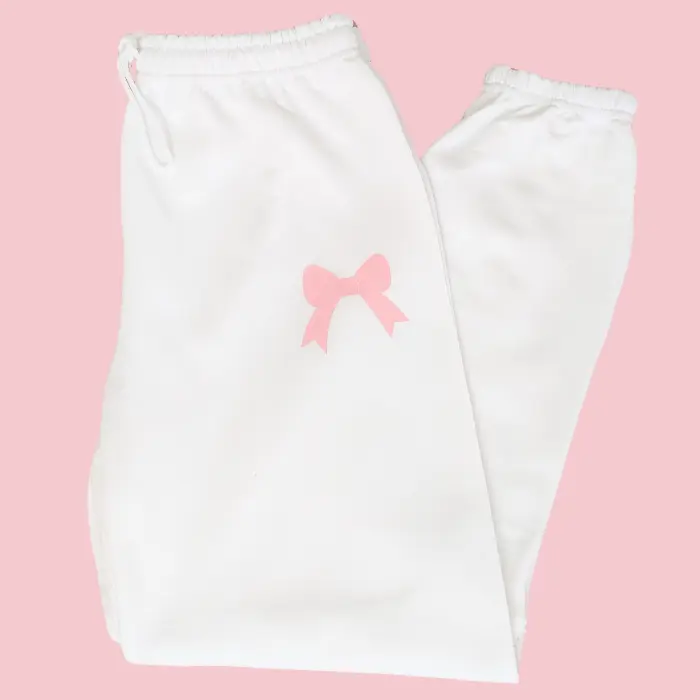 Pink Bow Sweatpants for Women, White Oversized Sweatpant, Preppy Girly Outfit, Vacation Outfits, Comfortable Coquette Pants, Cozy Loungewear, Trendy Cute Women's Joggers, Travel Airport Looks, 50 Cotton 50 Polyester Athleisure Bottoms