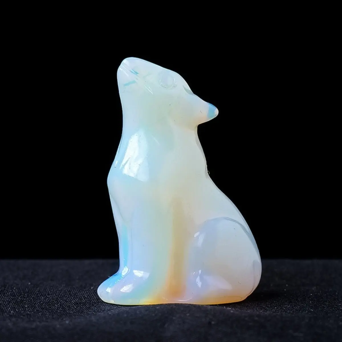 Natural Crystal Crystal Wolf Sculpture - A natural crystal carving of a baby wolf.